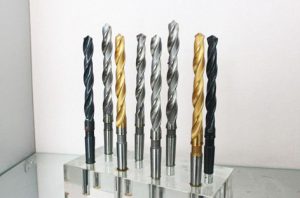 What is the difference between a carpenter drill bit and a metal drill bit?
